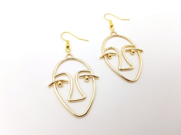 Gesichts Ohrringe goldfarben